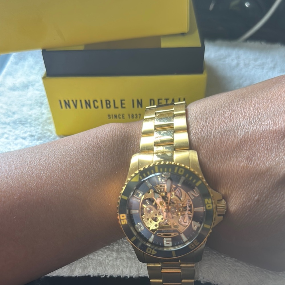 Invicta Gold Skeleton Dial Watch with Intricate Design